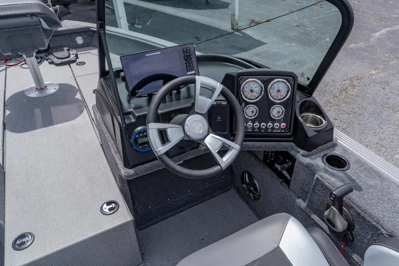 Slide: The Image of Interior view of 2026 G3 Angler V21 F boat cockpit with steering wheel and dashboard controls. - 9