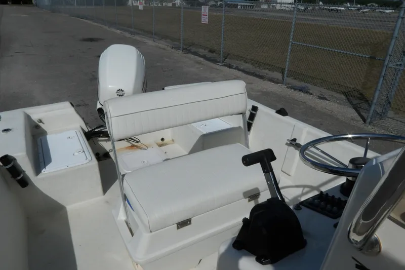 Slide: The Image of Interior view of a 2005 May-Craft 1800 Skiff boat. - 10