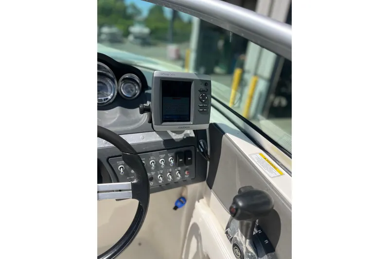 Slide: The Image of Steering console of 2011 Sea Ray 260 Sundeck with Garmin GPS display. - 18