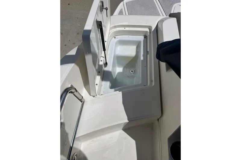 Slide: The Image of Open storage compartment on a 2011 Sea Ray 260 Sundeck boat. - 25