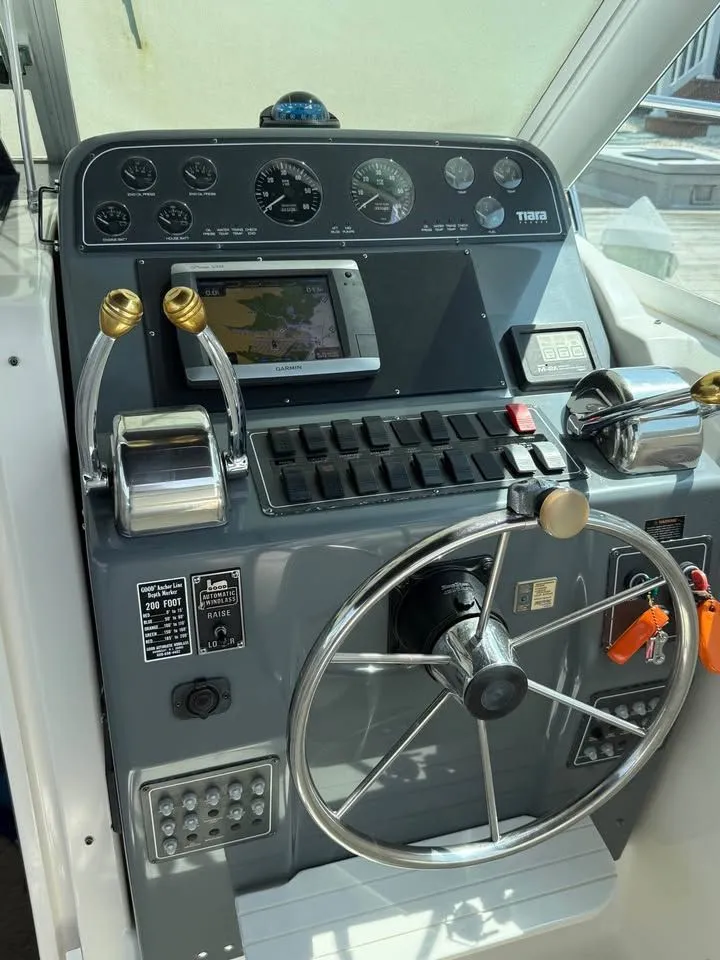 Slide: The Image of 1999 Tiara Yachts 2900 Coronet helm with navigation system. - 4