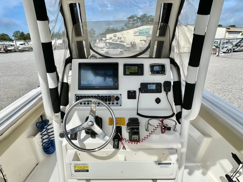 Slide: The Image of 2017 Key West 239 FS boat helm with navigation system. - 14