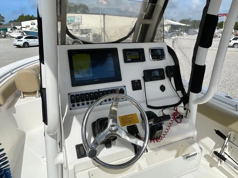 Slide: The Image of Helm console of a 2017 Key West 239 FS boat with navigation system. - 16