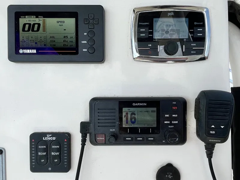 Slide: The Image of Boat dashboard with Yamaha, Polk, and Garmin devices, Key West 239 FS, 2017. - 17