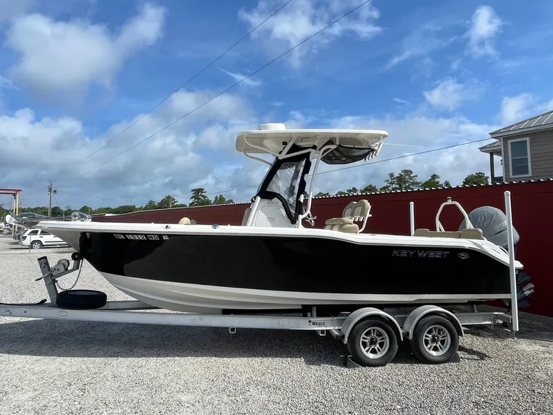Slide: The Image of 2017 Key West 239 FS boat on trailer, side view. - 2