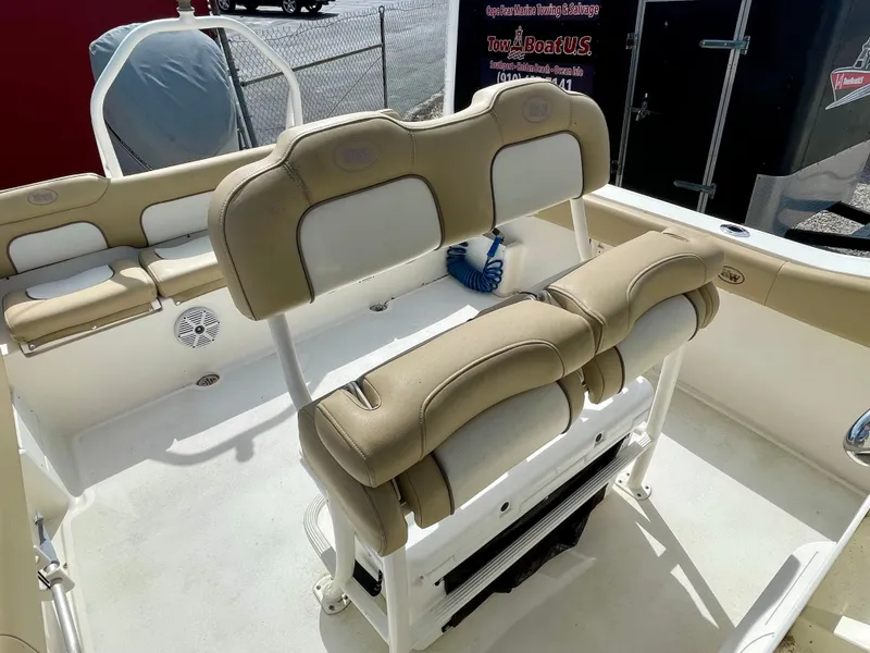 Slide: The Image of Interior of a 2017 Key West 239 FS boat with beige seating. - 21