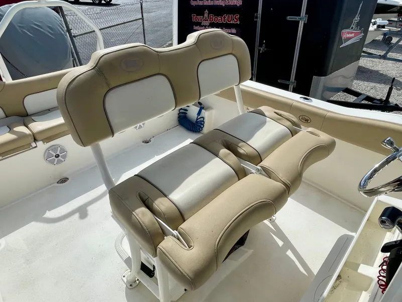 Slide: The Image of Interior of a 2017 Key West 239 FS boat with beige seating. - 22