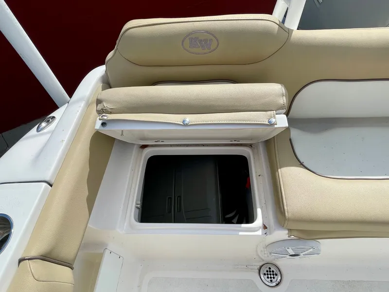 Slide: The Image of Key West 239 FS 2017 boat seat with storage compartment. - 26