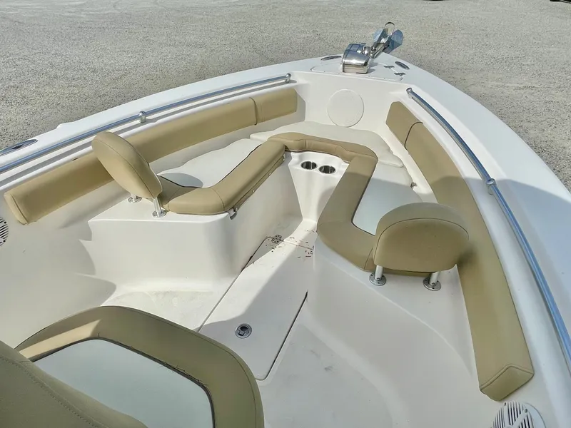 Slide: The Image of Interior view of a 2017 Key West 239 FS boat with beige seating. - 30