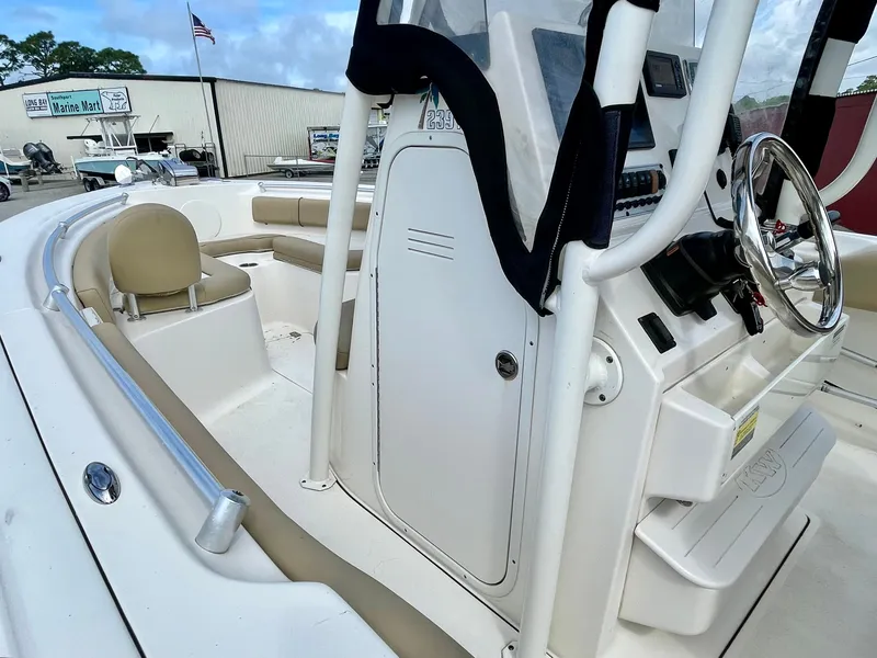 Slide: The Image of 2017 Key West 239 FS boat interior with steering wheel. - 38