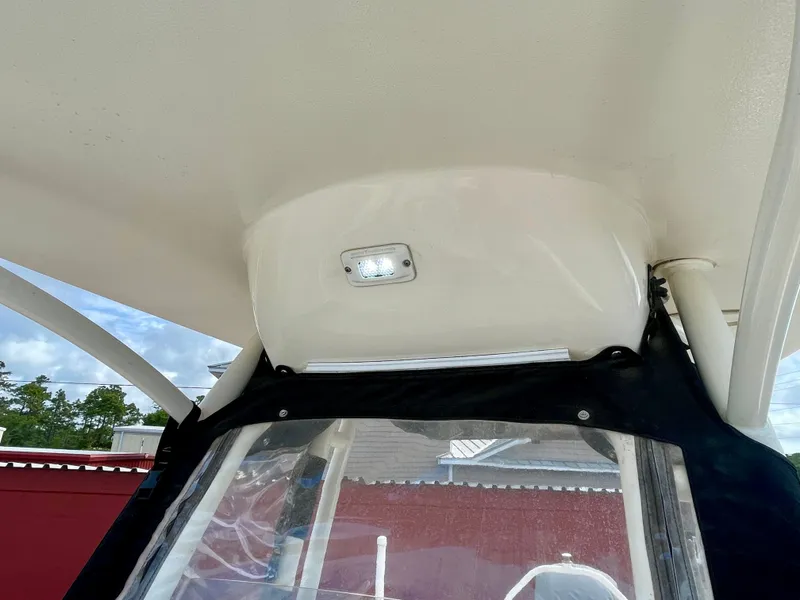 Slide: The Image of Interior view of a 2017 Key West 239 FS boat with lighting. - 42