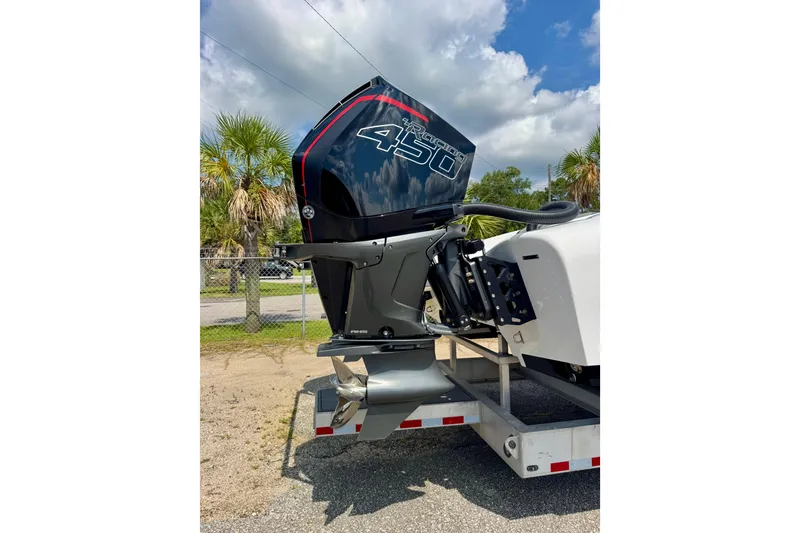 Slide: The Image of 2024 Fountain 34 Thundercat with powerful outboard engine on trailer. - 4