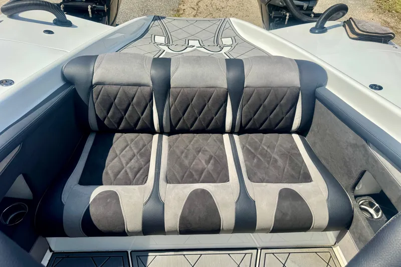 Slide: The Image of 2024 Fountain 34 Thundercat boat interior with stylish, cushioned seating and modern design. - 8