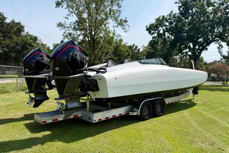 Slide: The Image of 2024 Fountain 34 Thundercat boat on trailer with dual 450 horsepower engines. - 25