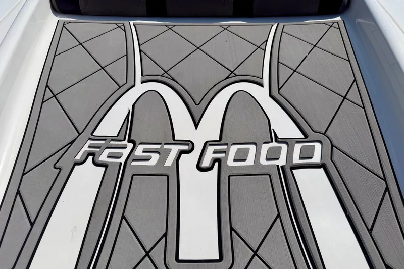 Slide: The Image of 2024 Fountain 34 Thundercat boat deck with "Fast Food" logo design. - 37