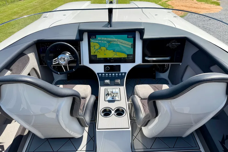 Slide: The Image of Interior view of 2024 Fountain 34 Thundercat boat cockpit with modern navigation system. - 42