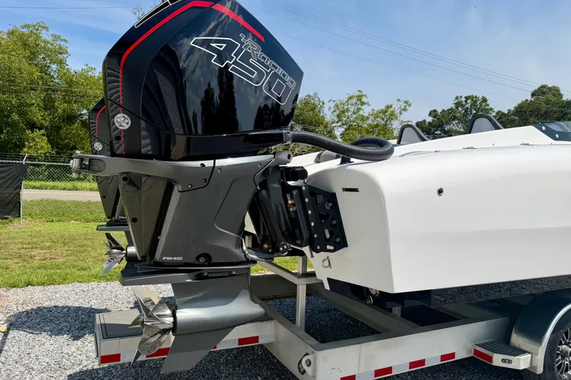 Slide: The Image of 2024 Fountain 34 Thundercat boat with powerful outboard engine on trailer. - 36