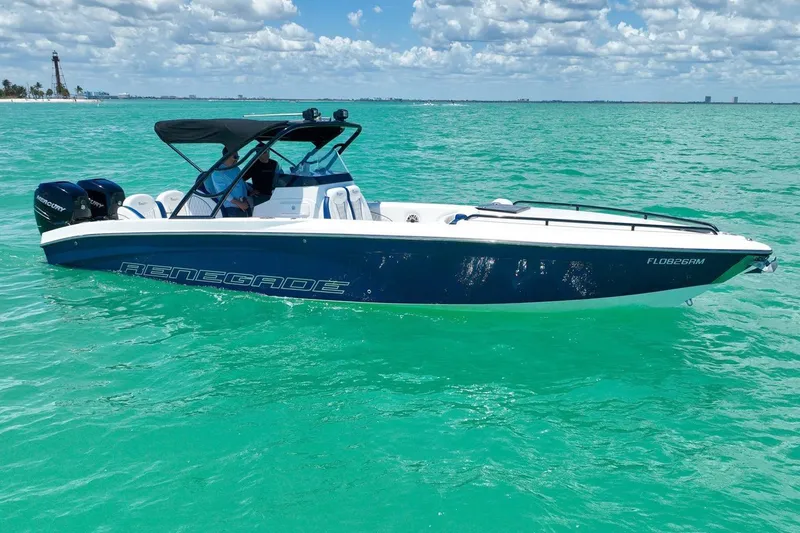The Image of 2018 Renegade 32' Cuddy boat on turquoise water. - 0