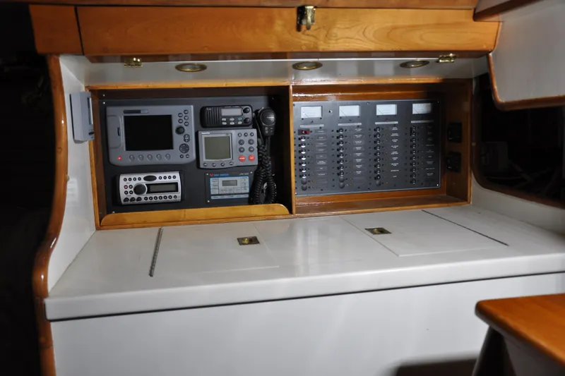 Slide: The Image of Navigation and control panel inside a 1970 Hinckley Bermuda 40 sailboat. - 21
