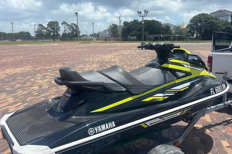Slide: The Image of 2019 Yamaha WaveRunner VX Deluxe parked on a trailer outdoors. - 11