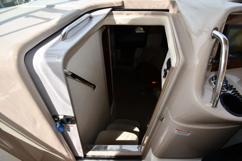 Slide: The Image of Entrance to cabin of 2003 Sea Ray 360 Sundancer yacht, featuring sleek design and modern amenities. - 22