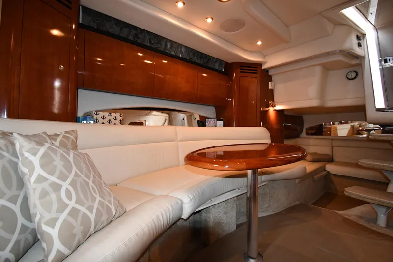 Slide: The Image of Luxurious interior of 2003 Sea Ray 360 Sundancer yacht with elegant seating and wooden finishes. - 32