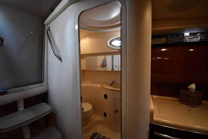Slide: The Image of Interior of 2003 Sea Ray 360 Sundancer yacht bathroom with modern amenities. - 33