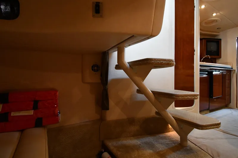Slide: The Image of Interior of 2003 Sea Ray 360 Sundancer with stairs and kitchenette in view. - 37