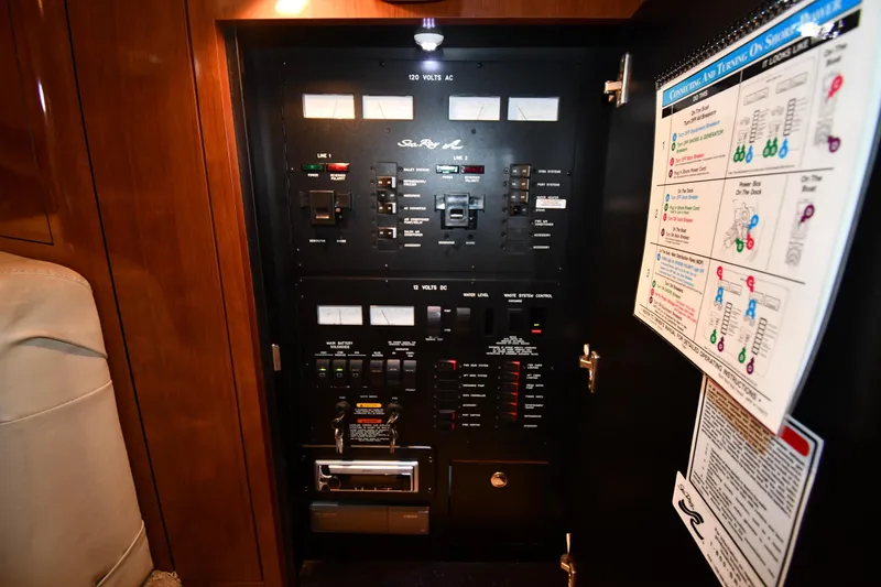 Slide: The Image of Electrical control panel inside a 2003 Sea Ray 360 Sundancer yacht. - 38