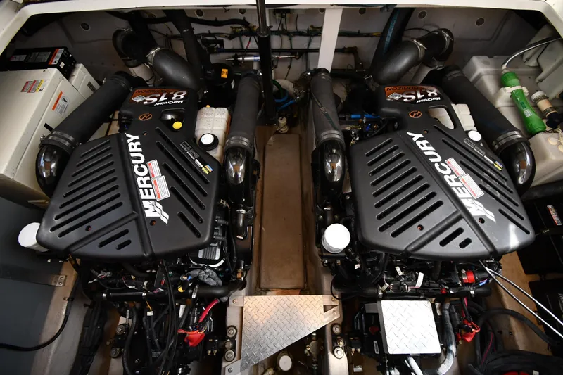 Slide: The Image of Engine room of 2003 Sea Ray 360 Sundancer with twin Mercury engines. - 45