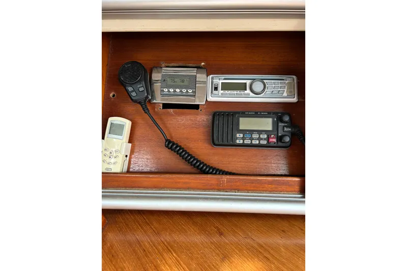Slide: The Image of Control panel of a 1992 Beneteau First 35s5 yacht with communication devices. - 22