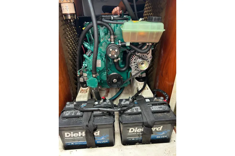 Slide: The Image of Engine compartment of a 1992 Beneteau First 35s5 sailboat with DieHard batteries. - 24