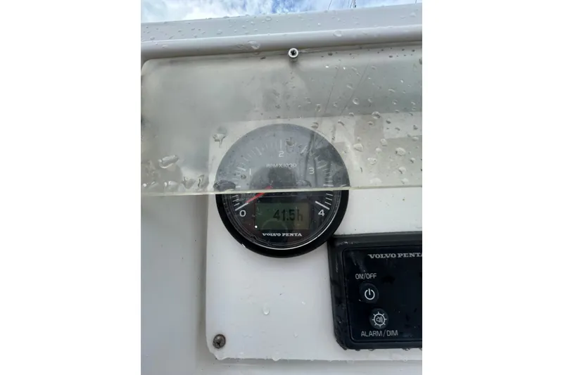 Slide: The Image of Volvo Penta gauge on 1992 Beneteau First 35s5 sailboat, showing 415 hours. - 28
