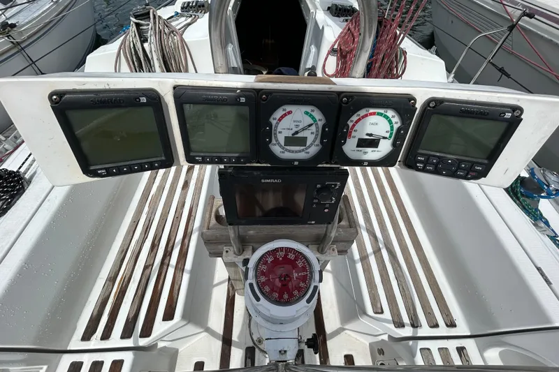 Slide: The Image of Cockpit of 1992 Beneteau First 35s5 sailboat with navigation instruments and compass. - 29