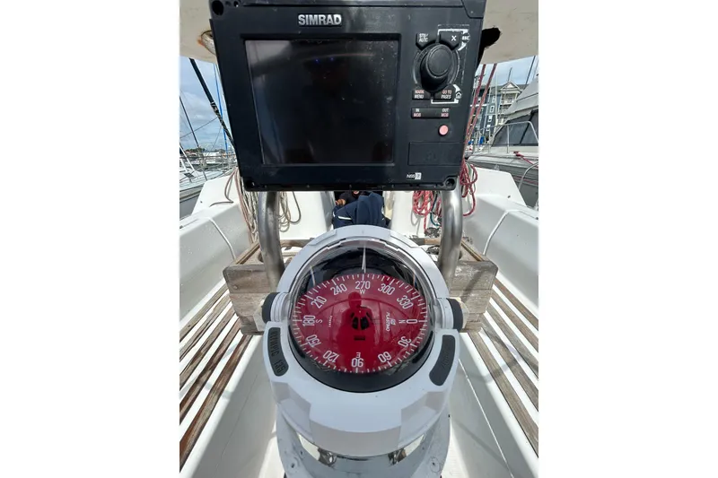 Slide: The Image of Compass and navigation system on a 1992 Beneteau First 35s5 sailboat. - 30