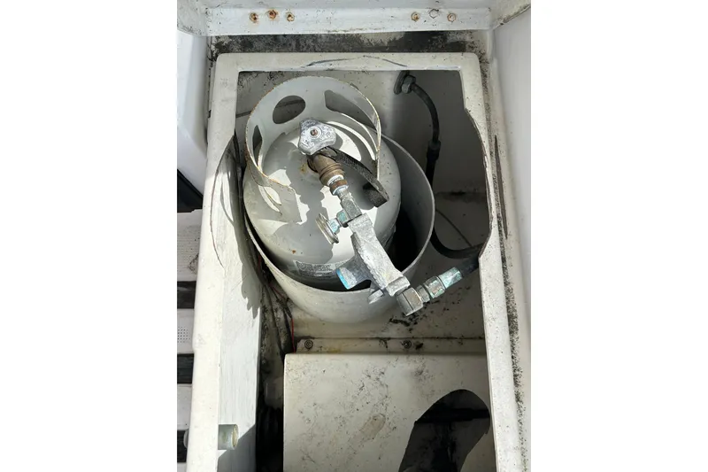 Slide: The Image of Propane tank compartment on a 1992 Beneteau First 35s5 sailboat. - 32
