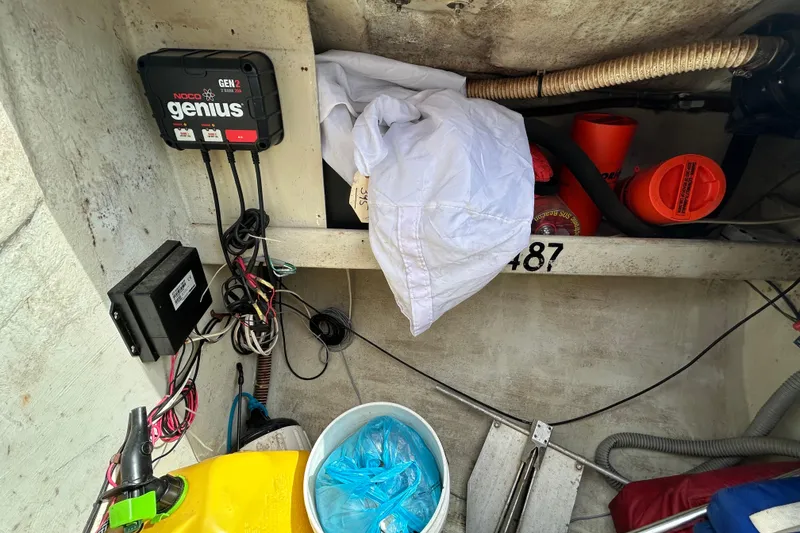 Slide: The Image of Interior of a 1992 Beneteau First 35s5 sailboat with equipment and wiring. - 33