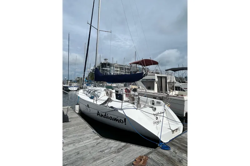 Slide: The Image of Sailboat docked at marina, 1992 Beneteau First 35s5, named "Andiamo," in Chicago. - 4