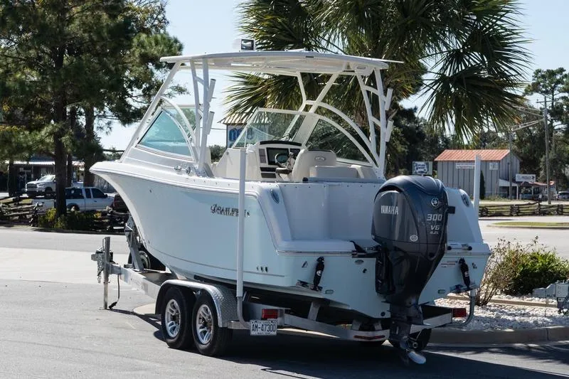 Slide: The Image of 2023 Sailfish 245 DC boat on trailer with Yamaha 300 V6 engine. - 4