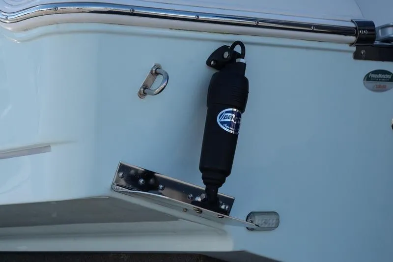 Slide: The Image of 2023 Sailfish 245 DC boat stern with mounted fender and hardware. - 7