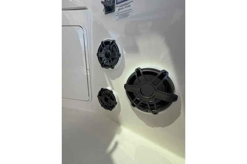 Slide: The Image of Speakers on a 2022 Boston Whaler 380 Realm boat interior. - 9