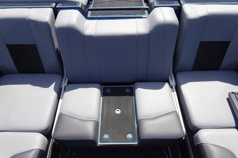 Slide: The Image of 2024 Malibu Wakesetter 23 MXZ interior seating with sleek, modern design and premium materials. - 12