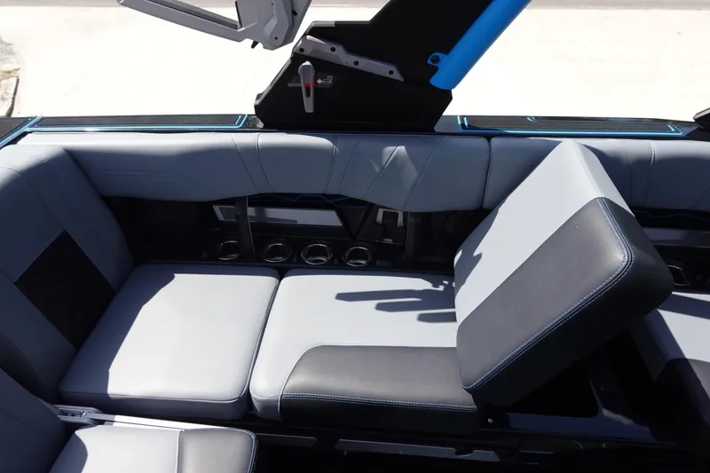 Slide: The Image of 2024 Malibu Wakesetter 23 MXZ interior seating with sleek design and modern upholstery. - 25