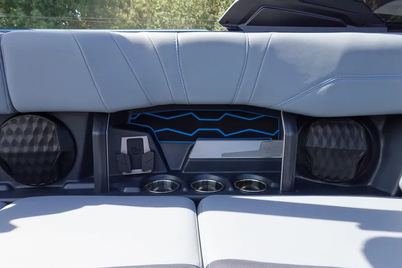 Slide: The Image of 2024 Malibu Wakesetter 23 MXZ interior with speakers and cup holders. - 28
