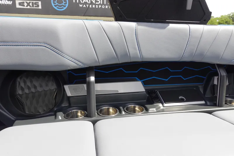 Slide: The Image of Interior of 2024 Malibu Wakesetter 23 MXZ boat with sleek seating and cup holders. - 30