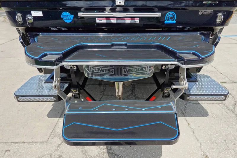 Slide: The Image of 2024 Malibu Wakesetter 23 MXZ boat rear view with Power Wedge III feature. - 6