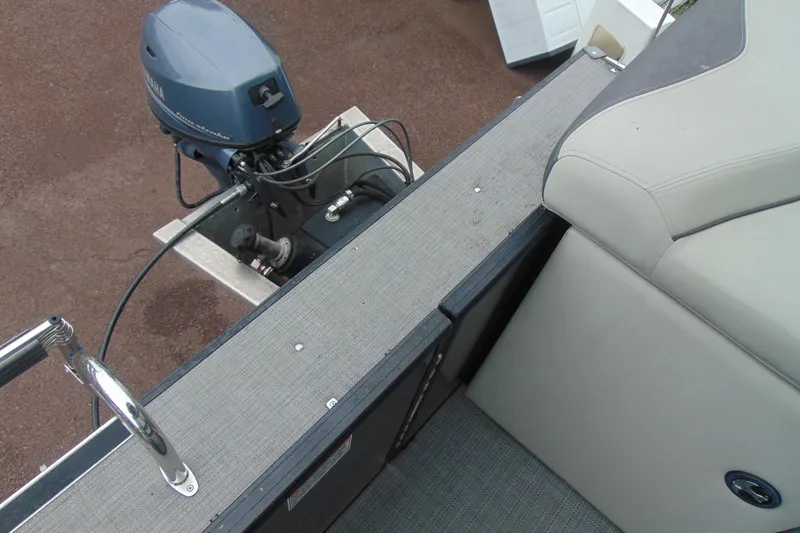 Slide: The Image of 2020 Sylvan Mirage 8520 Cruise boat with Yamaha outboard motor and beige seating. - 14