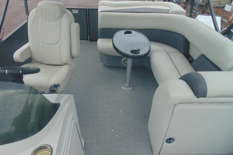 Slide: The Image of Interior of 2020 Sylvan Mirage 8520 Cruise pontoon boat with seating and table. - 6