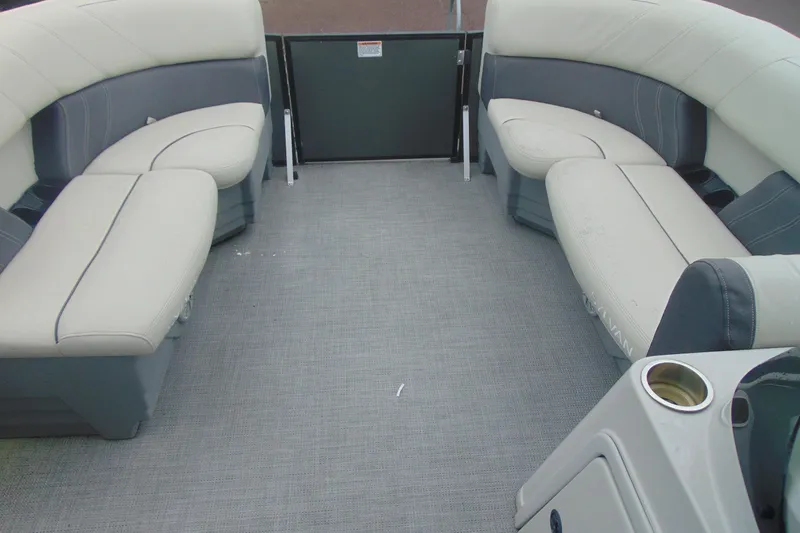 Slide: The Image of Interior of a 2020 Sylvan Mirage 8520 Cruise pontoon boat with cushioned seating. - 7