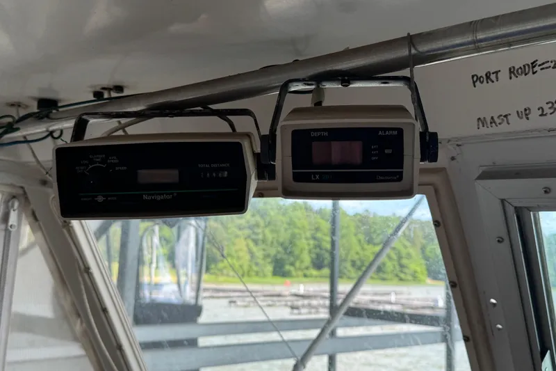 Slide: The Image of Navigational instruments inside a 1984 Kadey-Krogen 36 Manatee boat cockpit. - 27